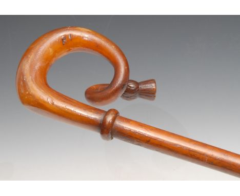 An early 20th century Scottish walking stick, the horn handle terminating in a thistle, 101cm long 