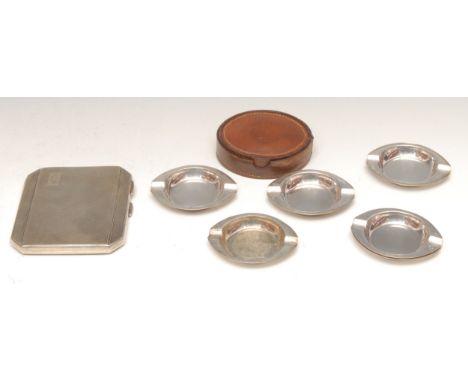 A set of six German silver stacking oval ashtrays, 7cm wide, marked with crescent, crown and 800, 93g, brown leather case, c.