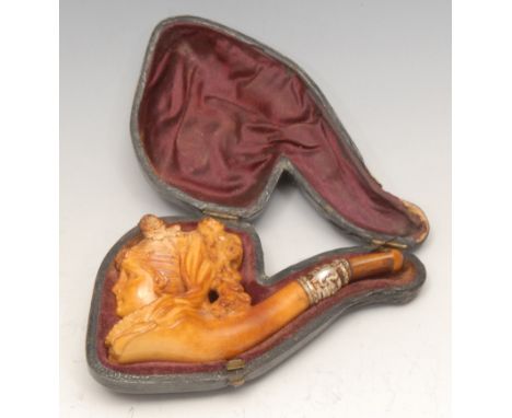 A 19th century German novelty meerschaum pipe, carved as the head of a lady, 9.5cm long, cased 