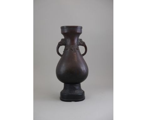 A Finely Cast Bronze Altar Vase, Song/Yuan dynasty, of ovoid section, the smooth pear shaped body rising from a high foot, de
