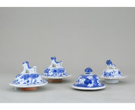 Four assorted Blue and White Lids, Qing dynasty, including one Kangxi one with prunus and cracked ice,  a pair with lion fini