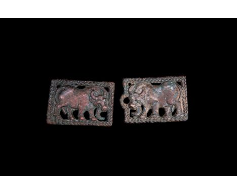 A Good Pair of Ordos Bronze Water Buffalo Belt Plaques, 4th/3rd century BC, each rectangular openwork plaque cast in low reli