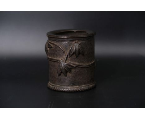 A Bronze Bamboo-shape Brushpot, Qing dynasty, The brushpot  is shaped like a bamboo joint. Decorated with bamboo leaves and r
