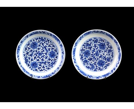 A Pair of Fine Blue and White Lotus Dishes, Kangxi, well painted in underglaze blue with lotus scrolls both inside and outsid