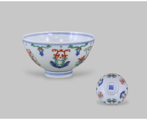 A Fine Wucai Bowl, six character seal mark of Qianlong in underglaze blue and of the period, finely decorated on the rounded 