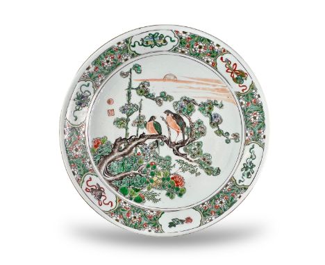 An Attractive'famille verte' Birds and Flowers Dish, Kangxi, of large saucer form, well painted in good enamels with two bird