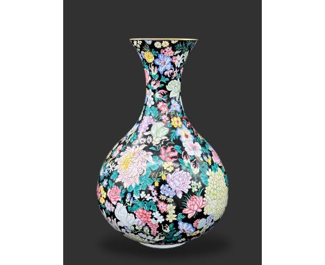 A Canton Enamel Millefleur Vase, Republic period, of pear shape with waisted neck flaring to the rim, brightly enamelled agai