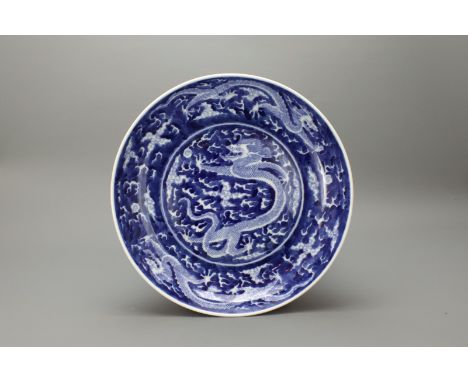  A Blue and White Dragon Dish, Kangxi Mark, W:24cm. good condition