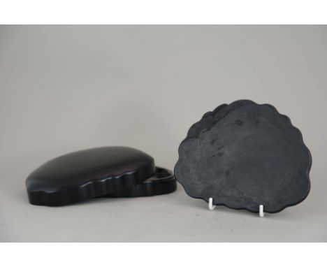 A Duan lotus leaf Inkstone and zitan box, Qing dynasty, one edge of the black stone finely carved with smaller leaves good co