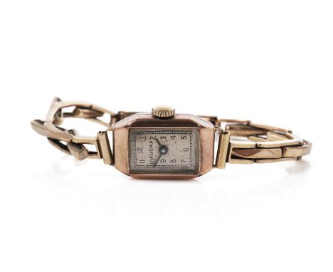 An Audax lady's 9ct rose gold manual wind cocktail wristwatch, on a gold elasticated bracelet strap, 13.5g gross.