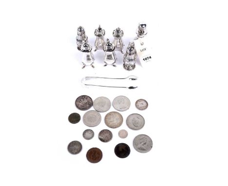 A selection of silver pepperettes; together with other items, including: a pair of tongs' a silver mounted scent bottle; a Qu