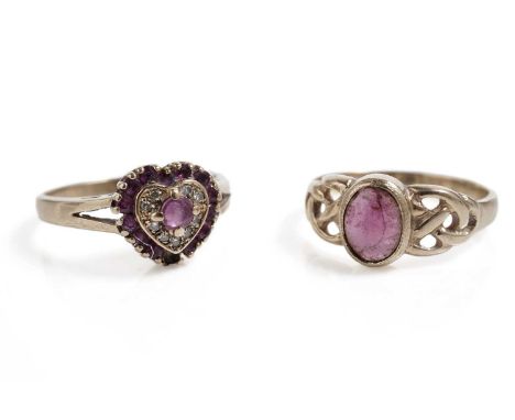 A ruby and diamond heart ring, in yellow gold, hallmarks indistinct, size N 1/2, 3.1g gross; and a garnet single stone ring, 