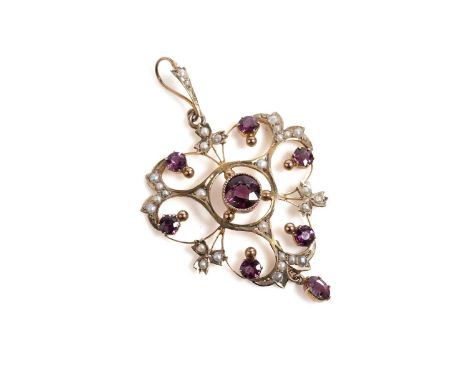 An Edwardian amethyst and seed pearl pendant, with amethyst drop detail and seed pearl set bale, in yellow gold, stamped "9ct