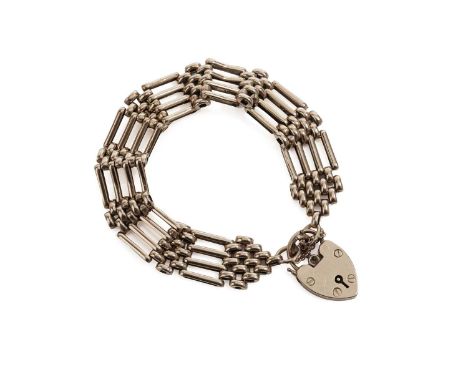 A 9ct yellow gold gate link bracelet, with heart-shaped padlock clasp, 19cms long, 29.2g gross.