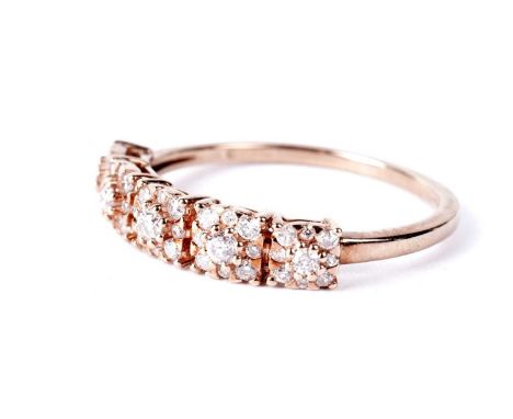 A diamond half hoop eternity ring, formed of five flower clusters set with round brilliant-cut diamonds, in 9ct rose gold, si