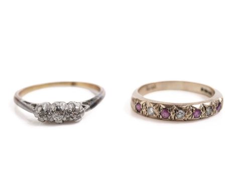 A ruby and diamond half hoop eternity ring, in 9ct yellow gold, size I 1/2, 2.2g gross; and a diamond three stone ring, in wh