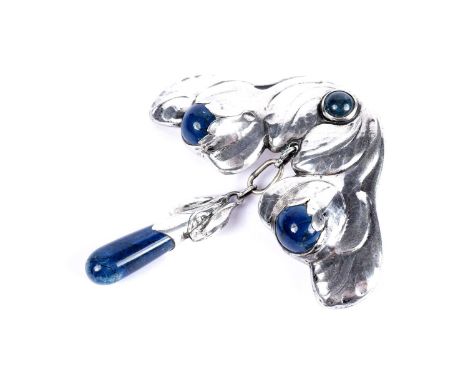 S.L. Jacobsen for Skonvirke, Denmark: a silver brooch, of leaf form set with blue-stone cabochons and drop, 7cms wide, 22.4g 
