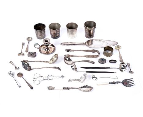 A selection of small silver items, to include: an apostle type sugar shifting spoon (some residual gilding); a caddy spoon, b