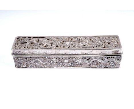 An early 20th Century Chinese silver box, by Wang Hing, pierced and embossed decoration with dragons amongst scrolling clouds