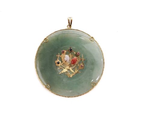A jadeite pendant, the circular jade disc with pierced centre overlaid with a pair of birds, detailed with ruby, sapphire and