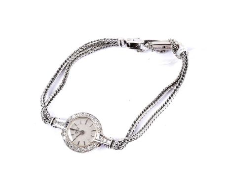 Vertex, Geneve: a diamond set cocktail watch, the silvered baton dial fitted a 17-jewel manual wind movement, in 18ct white g