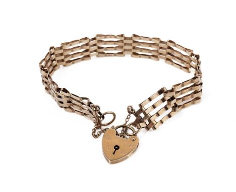 A 9ct yellow gold gate link bracelet, with heart-shaped padlock clasp and safety chain, 18cms wide, 10.6g gross.