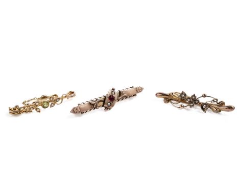 An Edwardian peridot and seed pearl bar brooch, in yellow gold, stamped "15", 35mm wide, with safety chain, 2.3g gross; an Ed