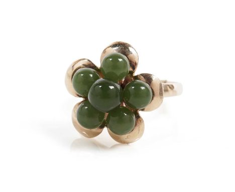 A bowenite cluster ring, in yellow gold, stamped "14K", size R, 5.1g gross.