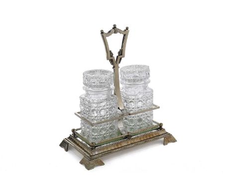A silver plated stand with two cut-glass jar and covers, the stand measuring 29.5cms high.