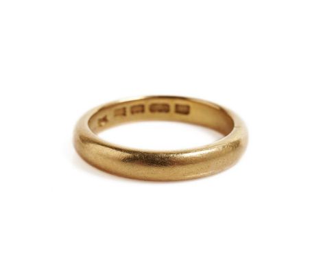 A 22ct carat yellow gold wedding ring, size P, 8.0g gross.