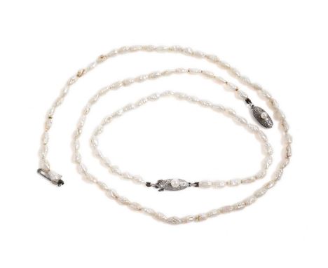 Mikimoto, Japan: a cultured freshwater pearl necklace, formed of a single strand of baroque freshwater pearls, on pearl set s
