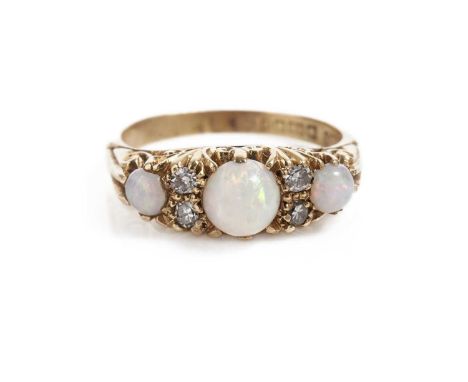 A Victorian style opal and diamond ring, in 18ct yellow gold, size M, 4.5g gross.