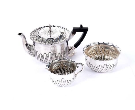 A three-piece silver tea service, by Lee &amp; Wigfull, Sheffield 1891, comprising teapot, sugar bowl and cream jug, all of h