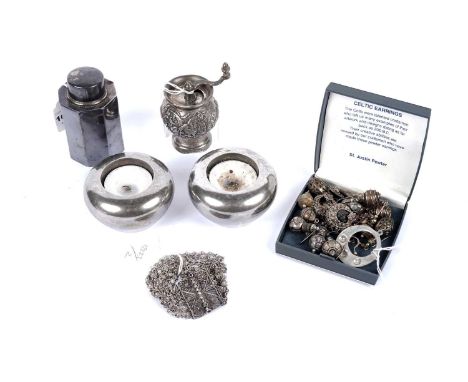 A selection of silver and other items, including: a Dutch silver pepper grinder; a silver tea canister; two metal tea candle 