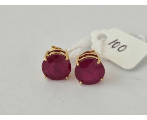 A matching pair of 18ct gold ruby earrings 4.2 gms