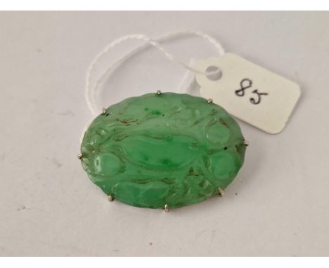 A white gold mounted jade brooch