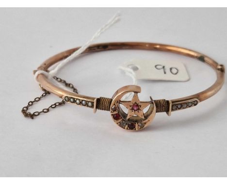 A crescent star and pearl bangle 9ct 5.6 gms