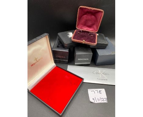 A box of nine assorted watch boxes including SEKONDA and ZENITH