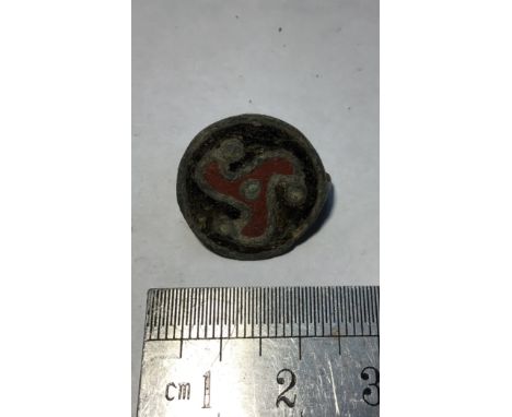 Roman Triskele disc brooch. Circa 2nd Century AD. Copper alloy, 4.53g. Dia19.5mm. The design is related to Celtic traditions 