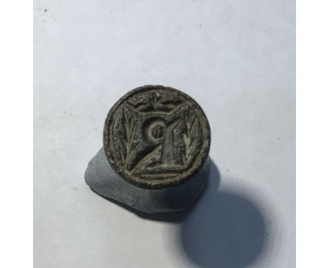 Copper alloy medieval chess piece style fob seal. Seal depicts the letter "R" with a crown above. 8.32g. Seal Dia15.7mm. Heig