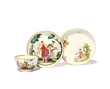 A rare Nove teabowl and two saucers, c.1765-70, the teabowl painted with travelling figures in a continuous landscape, the sa
