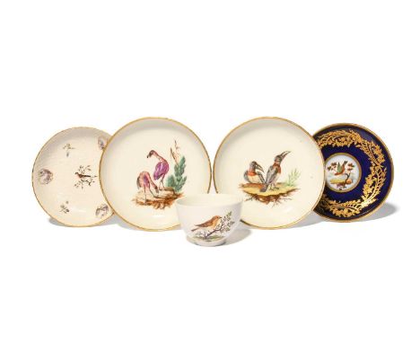 A rare pair of German porcelain ornithological saucers, c.1770-80, possibly Ansbach, naturalistically painted with pairs of b