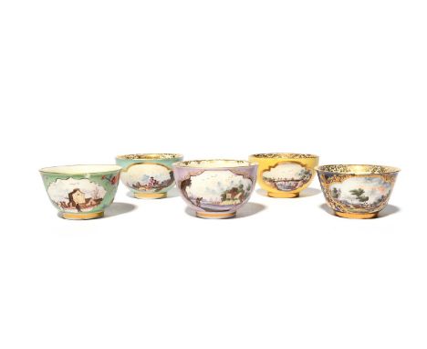 Five Meissen teabowls, c.1735-40, variously painted with panels of Kauffahrtei and figures in landscapes, including two skate