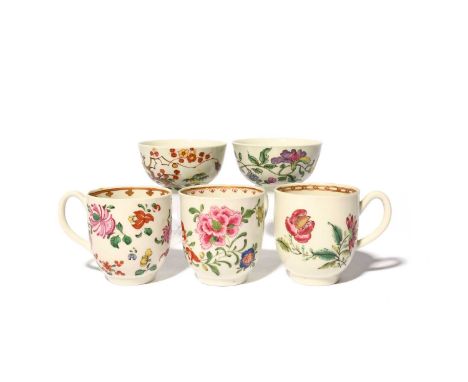 Three Worcester coffee cups and two teabowls, c.1755-60, the teabowls painted with Oriental inspired designs, one with an orc