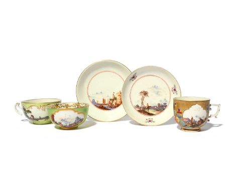 An associated Meissen teabowl and saucer, c.1735, painted with Kauffahrtei and other scenes, reserved on an apple green groun