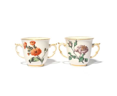 A pair of Chelsea two-handled botanical cups, c.1756-50, finely painted with flower specimens including damask rose and calen