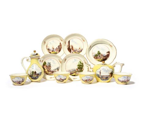 A Meissen yellow-ground part tea service, c.1735-40, painted with Kauffahrtei and other scenes of figures in harbours and oth