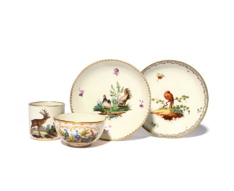 A Loosdrecht teabowl and a saucer, c.1778-82, the teabowl painted with panels of peacocks and other exotic birds, the saucer 