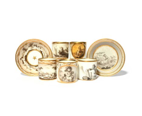 Five Paris porcelain coffee cans and two saucers, c.1795-1800, a Nast can and saucer with a continuous monochrome landscape, 