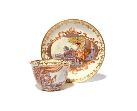 A Meissen teabowl and saucer, c.1730-25, the saucer finely painted with a huntress and her dog and bird of prey beside a tall